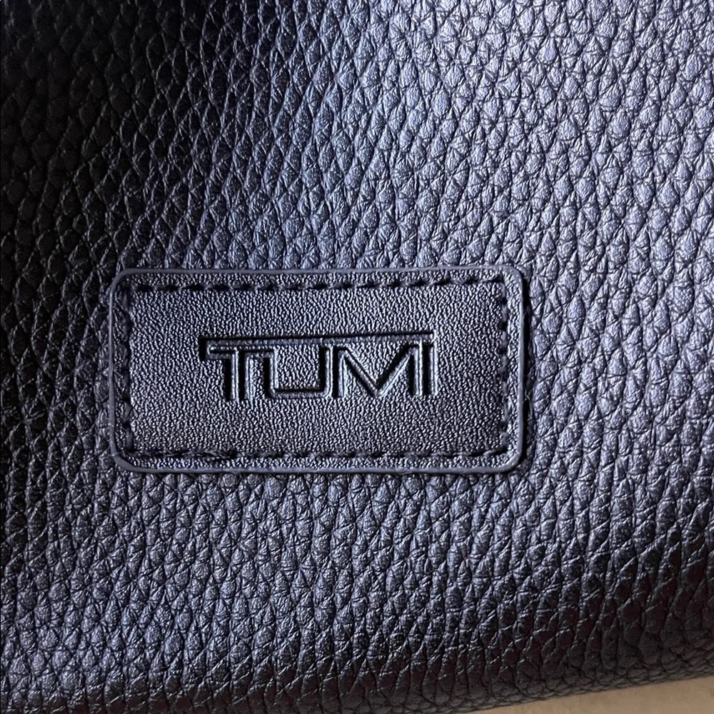 TUMI Textured Black Faux Leather toiletrie / travel bag